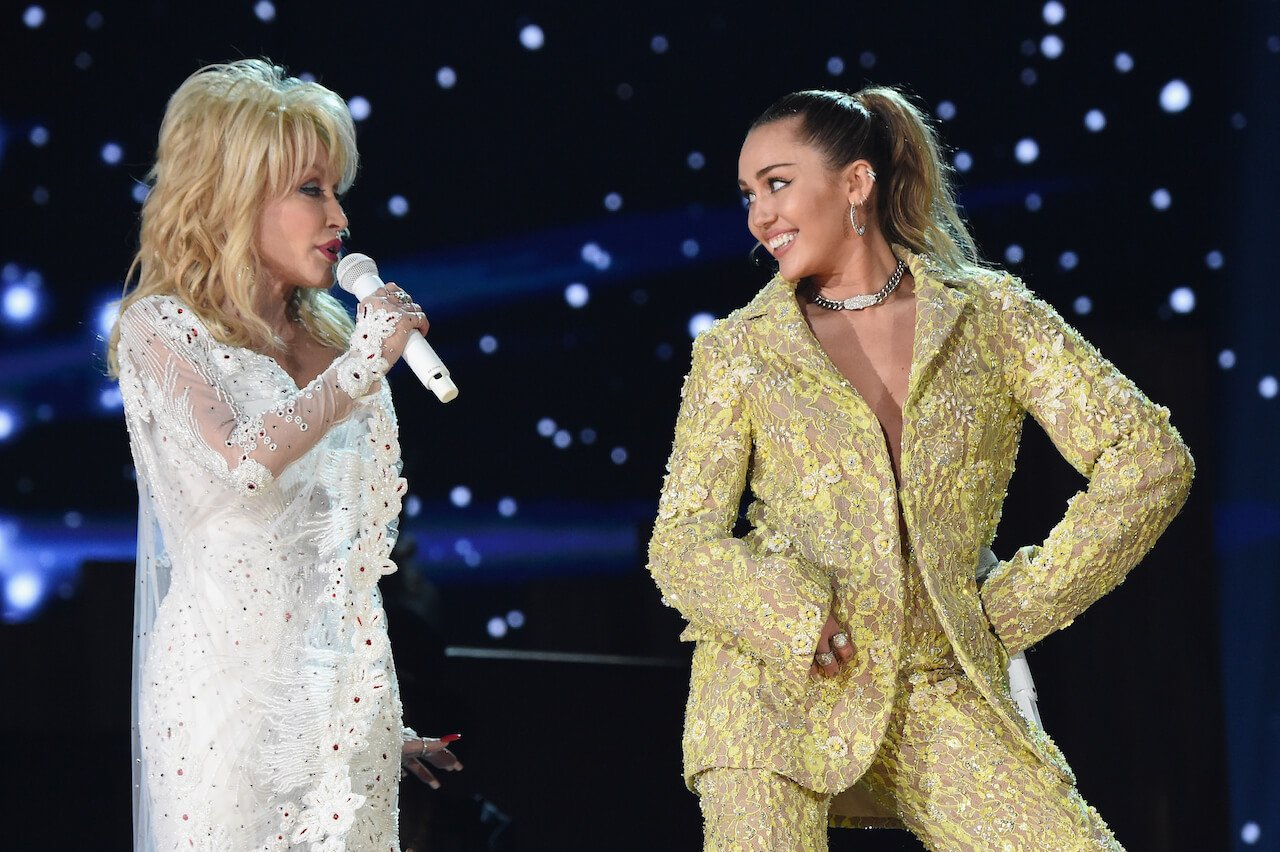 Dolly Parton (L) and Miley Cyrus perform onstage during the 61st Annual GRAMMY Awards at Staples Center on February 10, 2019.