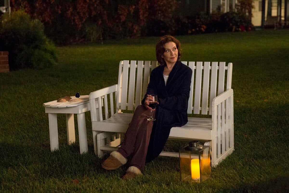 Kelly Bishop, as Emily Gilmore, enjoys a quiet summer evening in 'Gilmore Girls: A Year in the Life'