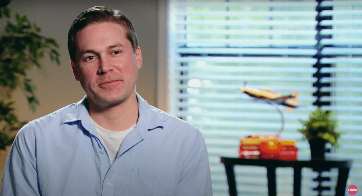'Married at First Sight' Season 12 cast member Erik Lake, wearing a blue polo