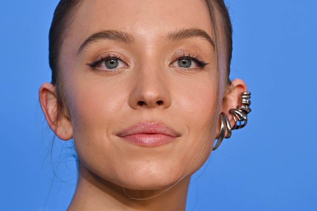 Frankies Bikinis collaborator Sydney Sweeney with silver hoops in her ears