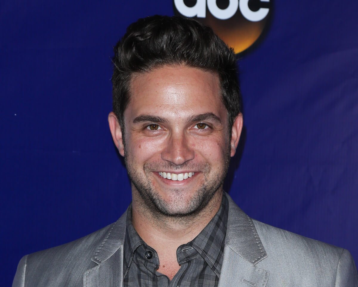 'Gilmore Girls' guest star Brandon Barash smiles on a red carpet