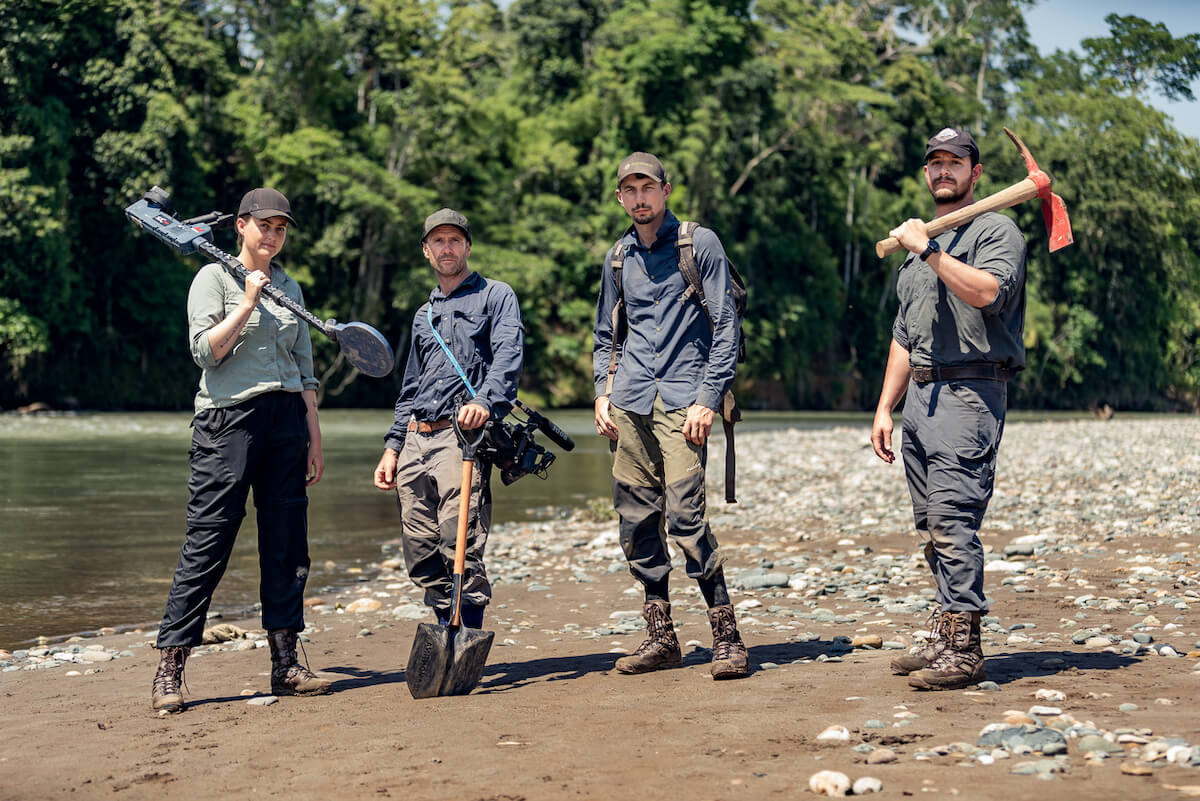 The 'Gold Rush: Parker's Trail' cast standing in a stream