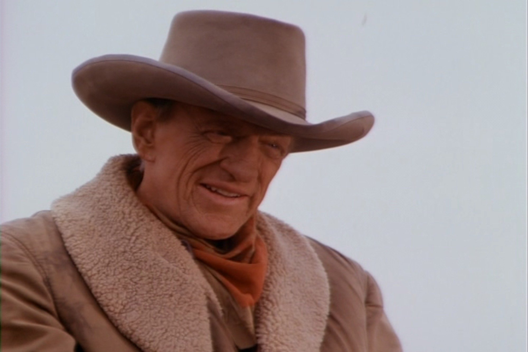 'Gunsmoke: To the Last Man' James Arness as Matt Dillon with a smile on his face wearing a Western costume.