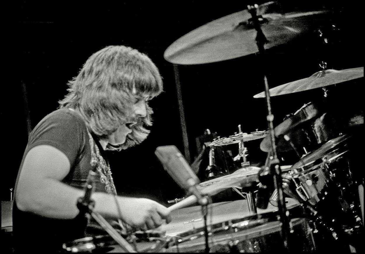Led Zeppelin's John Bonham plays drums during a 1975 concert in London.