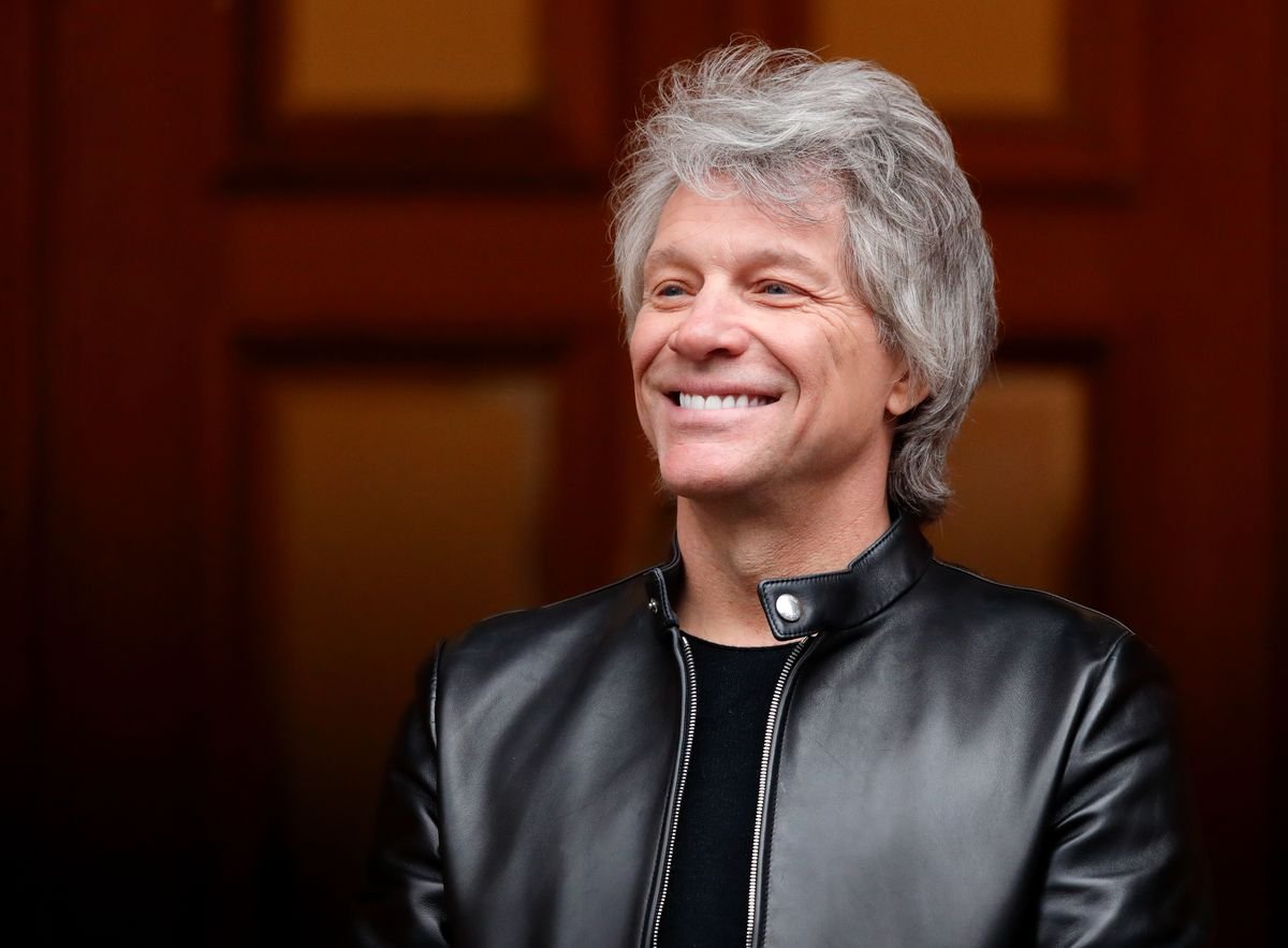 Jon Bon Jovi stands in front of Abbey Road Studios