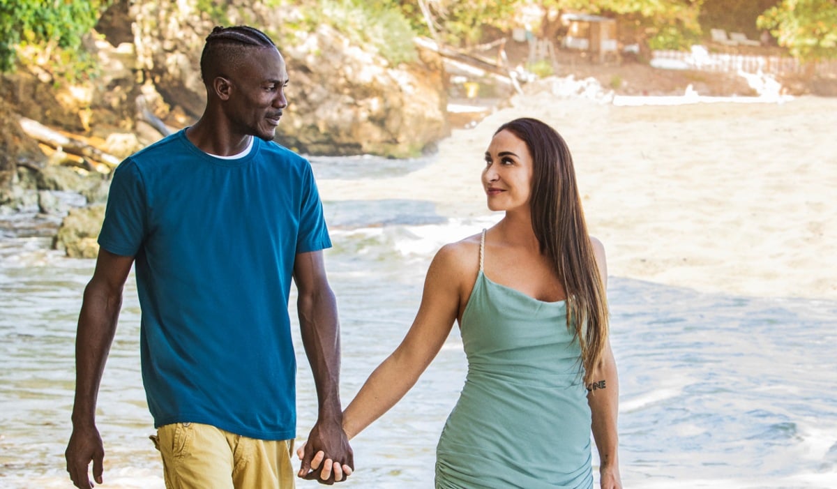 Jordan and Everton walking together on the beach for '90 Day Fiancé: Love in Paradise' Season 3 promo on TLC.