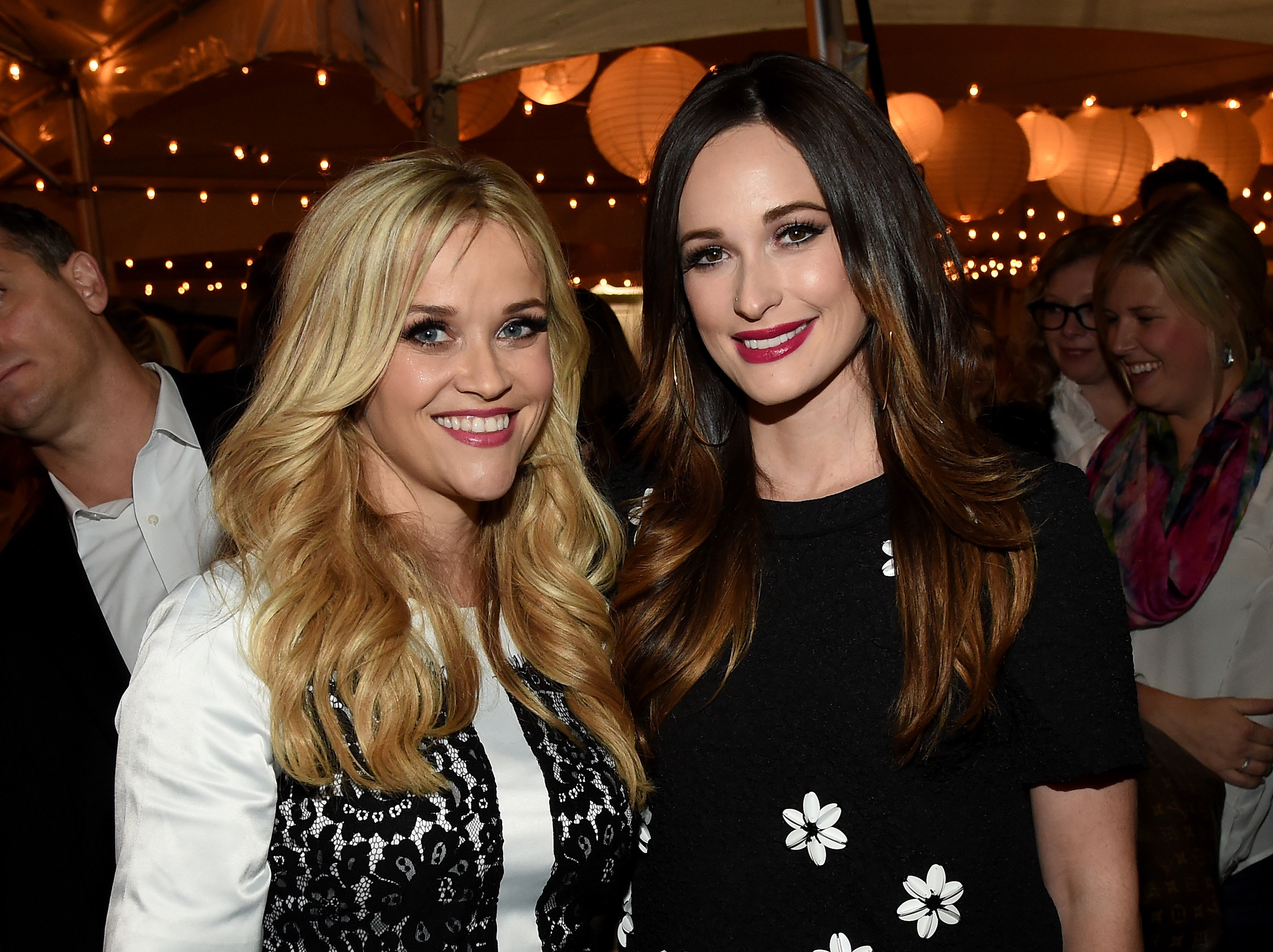 Reese Witherspoon and Kacey Musgraves attend the Draper James Nashville store opening