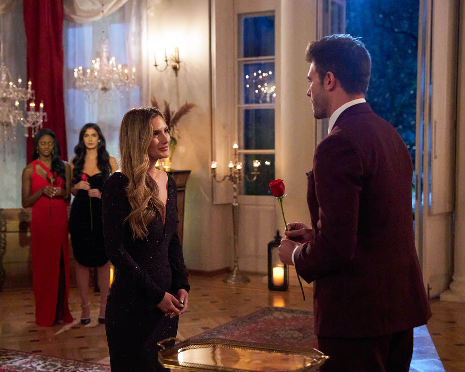 Zach Shallcross handing Kat Izzo a rose in 'The Bachelor' Season 27