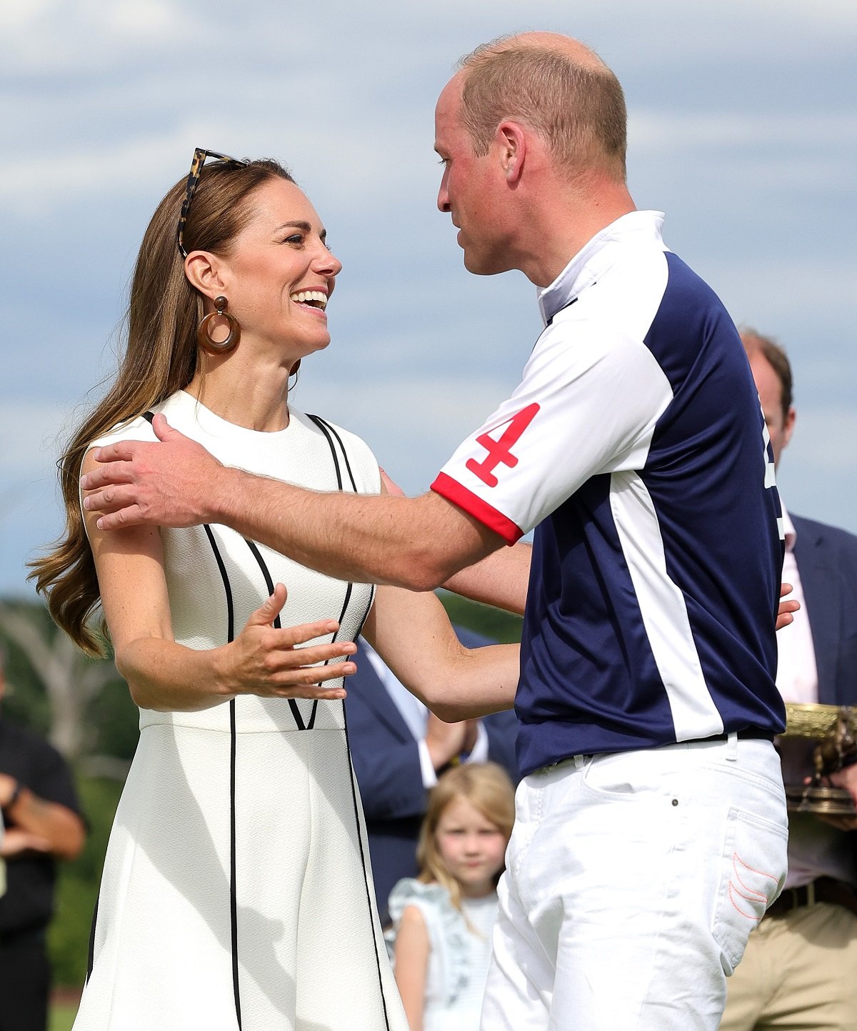 Kate Middleton and Prince William about to embrace after the Royal Charity Polo Cup