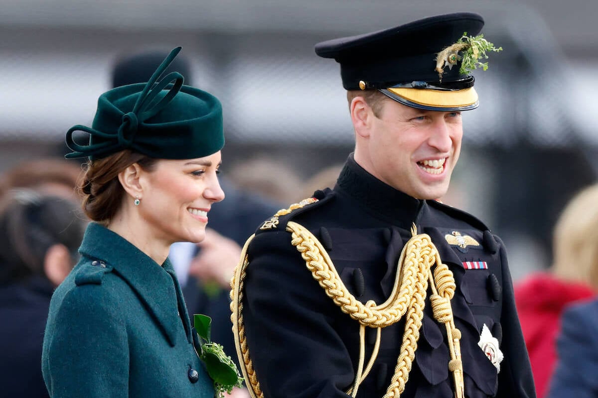 Kate Middleton and Prince William who appeared 'broody' for child four in 2022, look on
