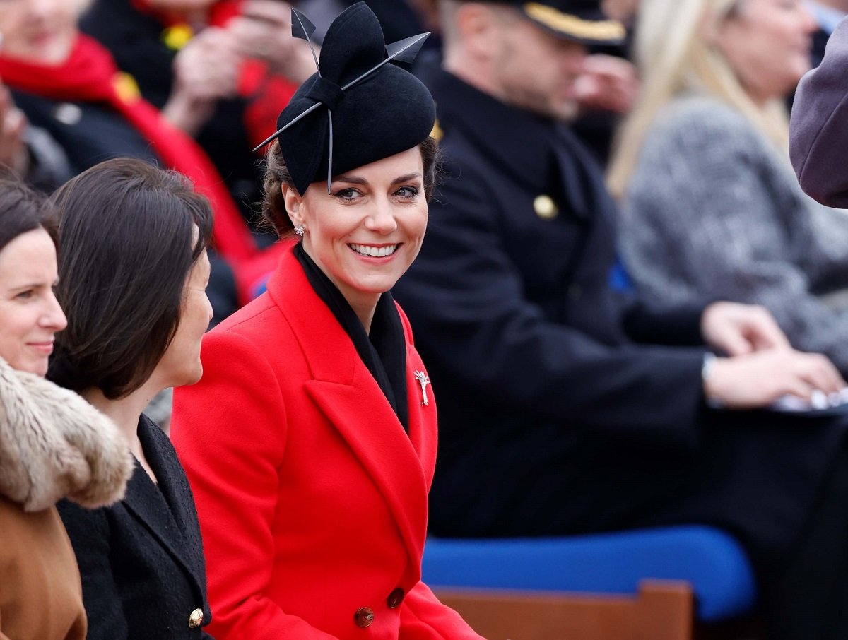 Kate Middleton, whose body language has been analyzed amid Prince Harry and Meghan Markle eviction news, attends the St David's Day Parade during a visit to the 1st Battalion Welsh Guards