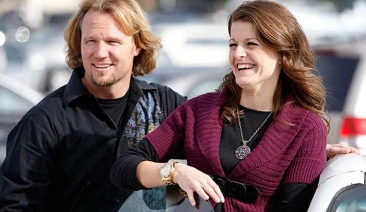 'Sister Wives' stars, Kody Brown and Robyn Brown smiling in an earlier season of the TLC series.