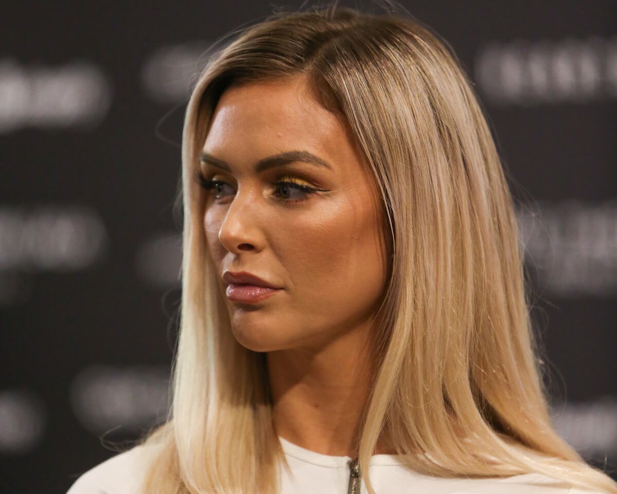 Lala Kent looking off to the side with a serious face