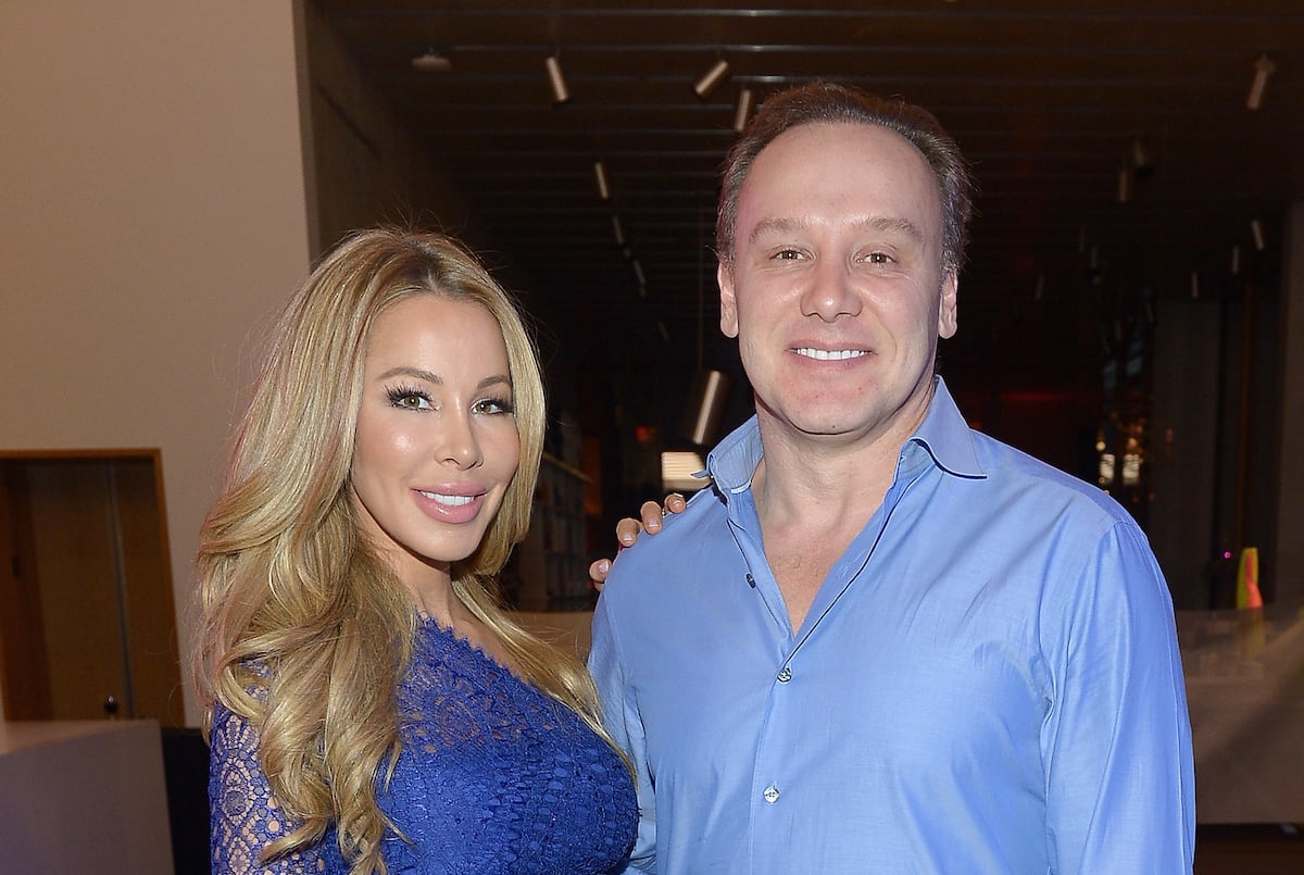 Lisa Hochstein and Lenny Hochstein wearing blue