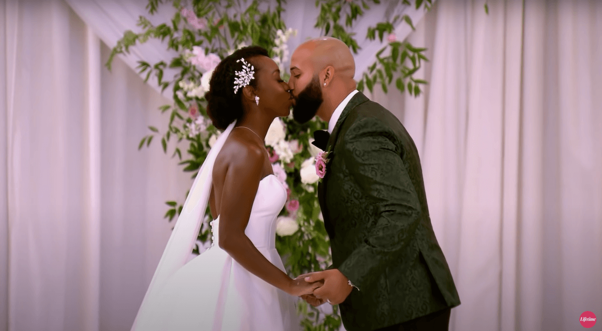 Briana and Vincent from 'Married at First Sight' Season 12 kissing at the altar