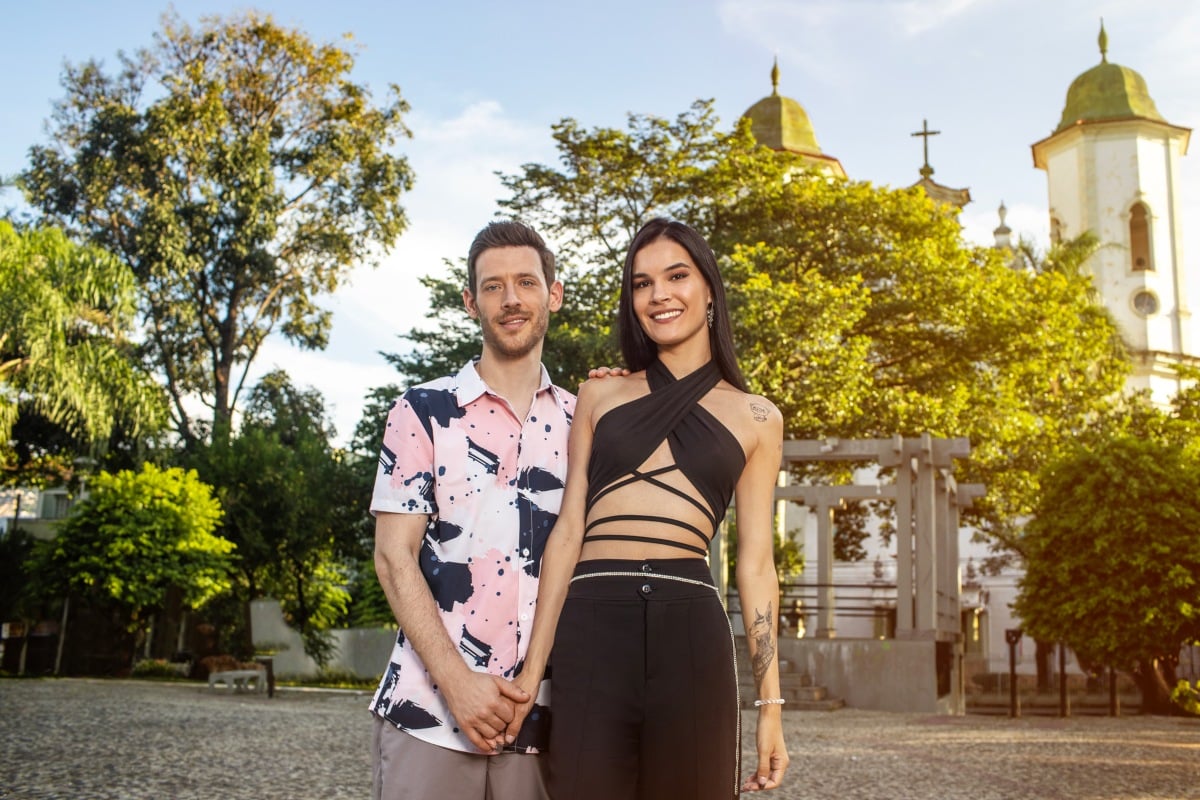 Jessica and Juan standing together for '90 Day Fiancé: Love in Paradise' Season 3 promo on TLC.