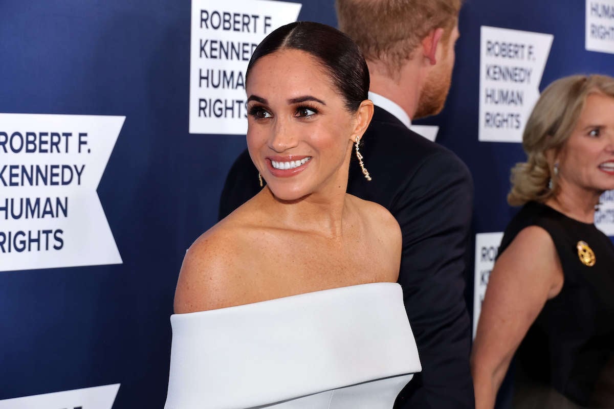 Meghan Markle, whose trademark for 'Archetypes' has been rejected, smiles