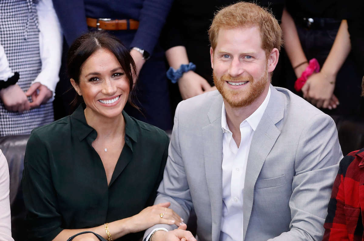 Meghan Markle, who compared Nottingham Cottage to a 'frat house,' sits with Prince Harry
