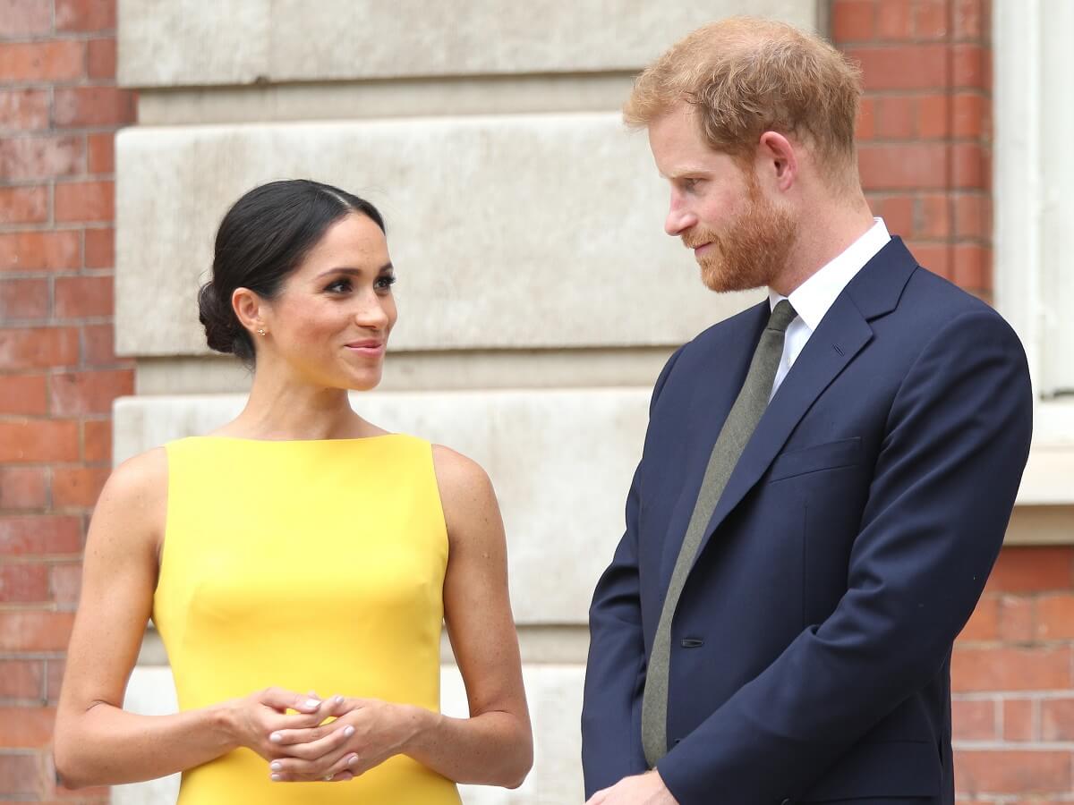 Meghan Markle and Prince Harry, who are now causing some coronation chaos, at the Your Commonwealth Youth Challenge reception in London