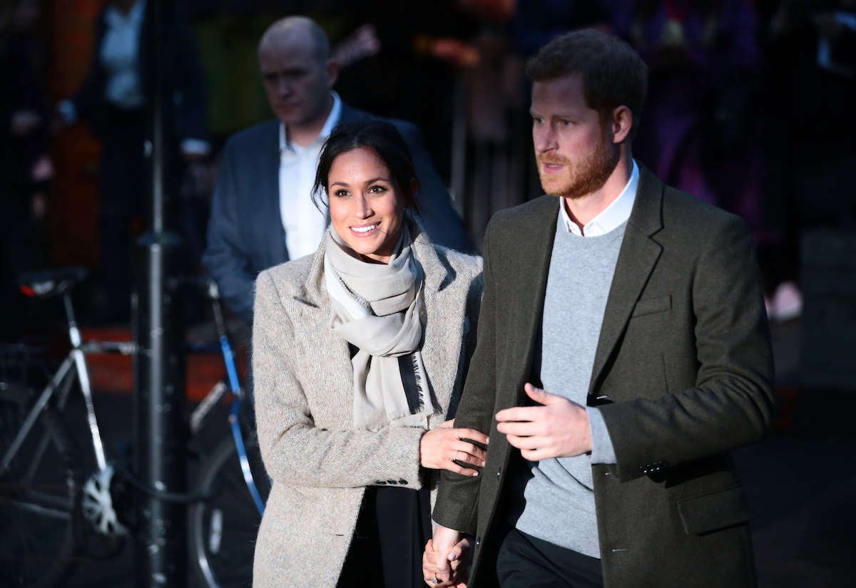 Meghan Markle, who reportedly didn't like the royal family's 'pecking order,' walks with Prince Harry