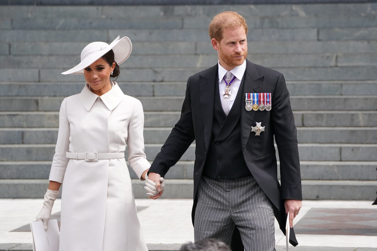 Meghan Markle and Prince Harry, who have unlikely coronation 'demands' including standing on balcony, look on