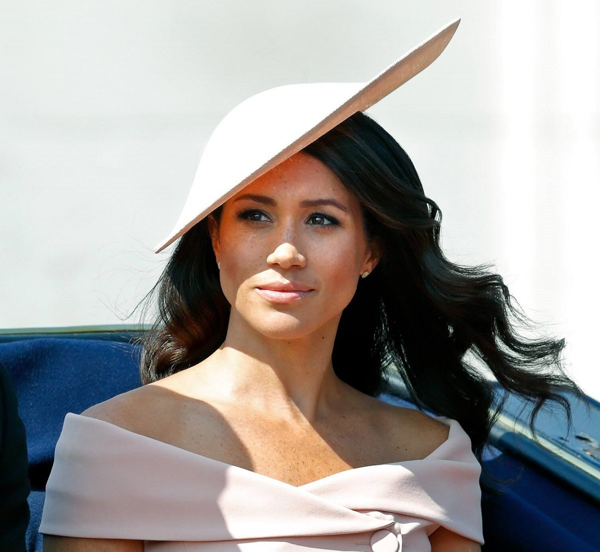 Meghan Markle, who may be publishing her own memior, travels down The Mall in a horse drawn carriage during Trooping The Colour 2018