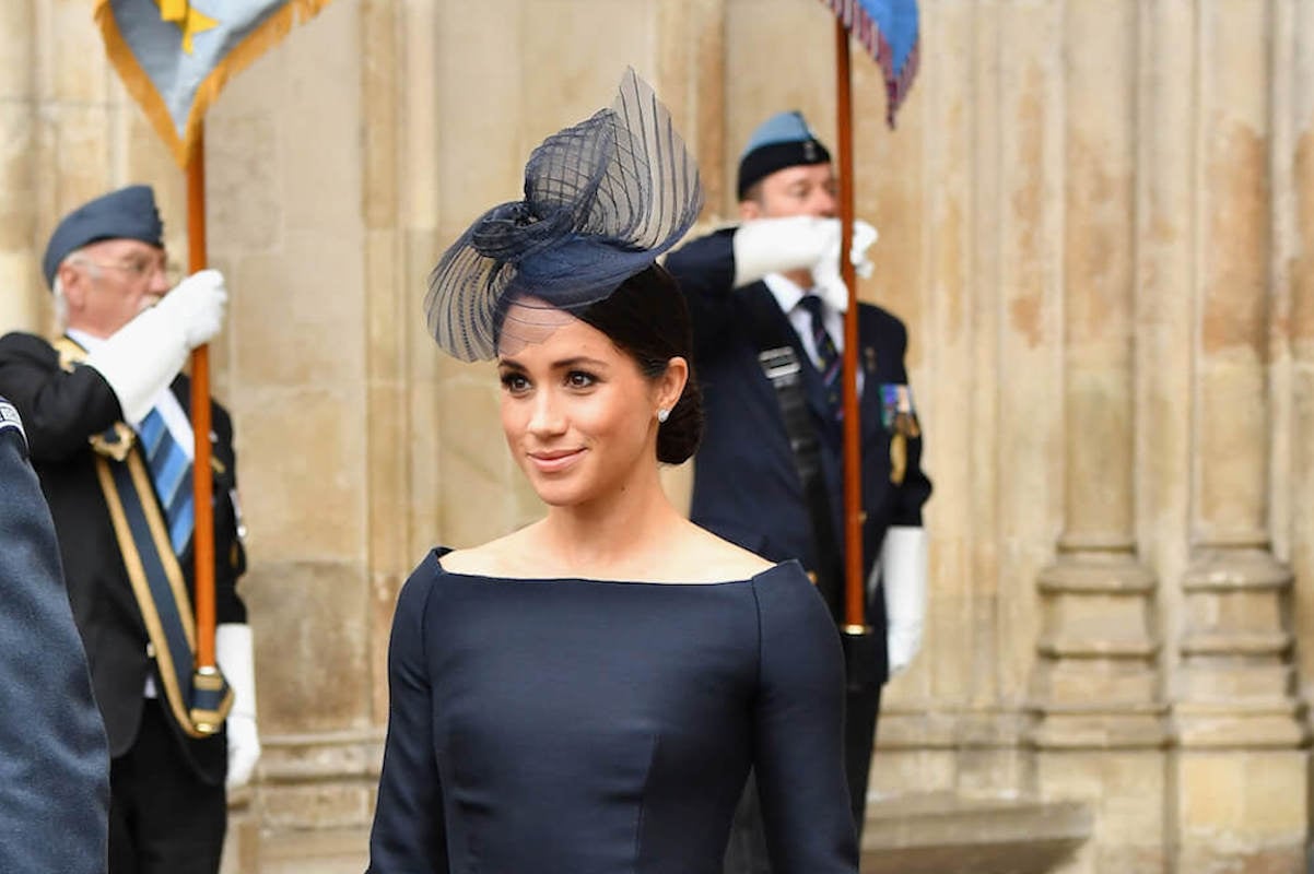 Meghan Markle, who a fashion expert says wears Christian Dior as 'fashion armor,' wears Dior in 2018