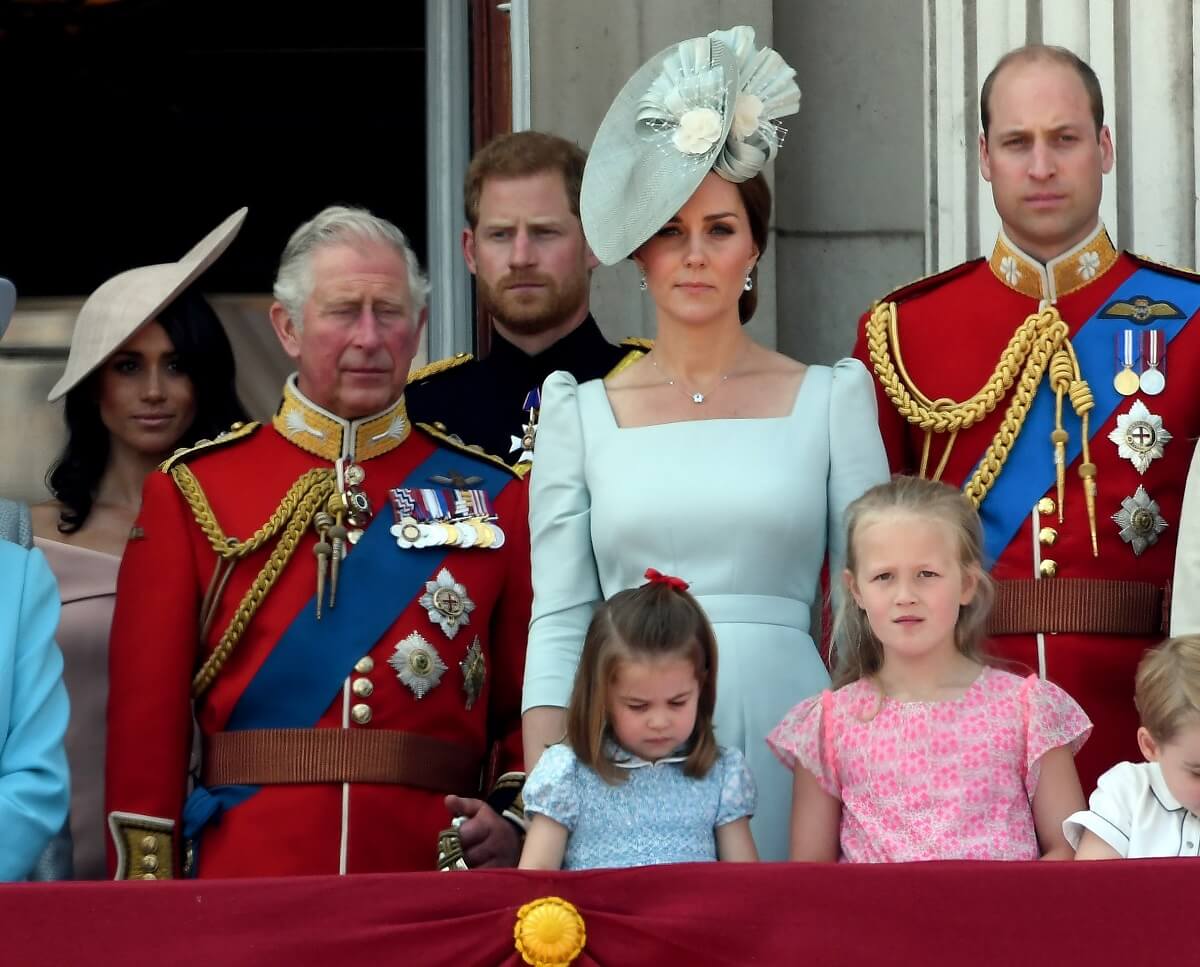 Members of Britain's royal family standing on the balcony of Buckingham Palace during Trooping The Colour 2018