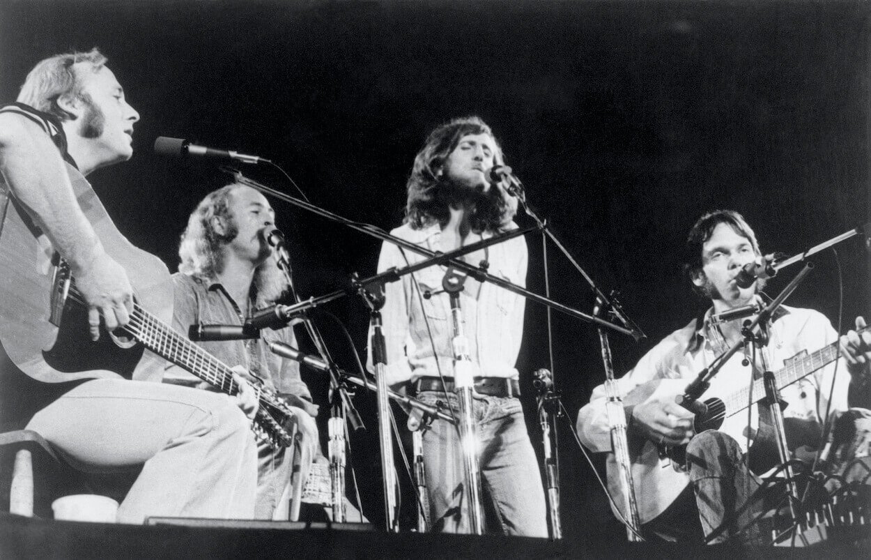 Stephen Stills (from left), David Crosby, Graham Nash, and Neil Young play together as Crosby, Stills, Nash & Young in 1974.