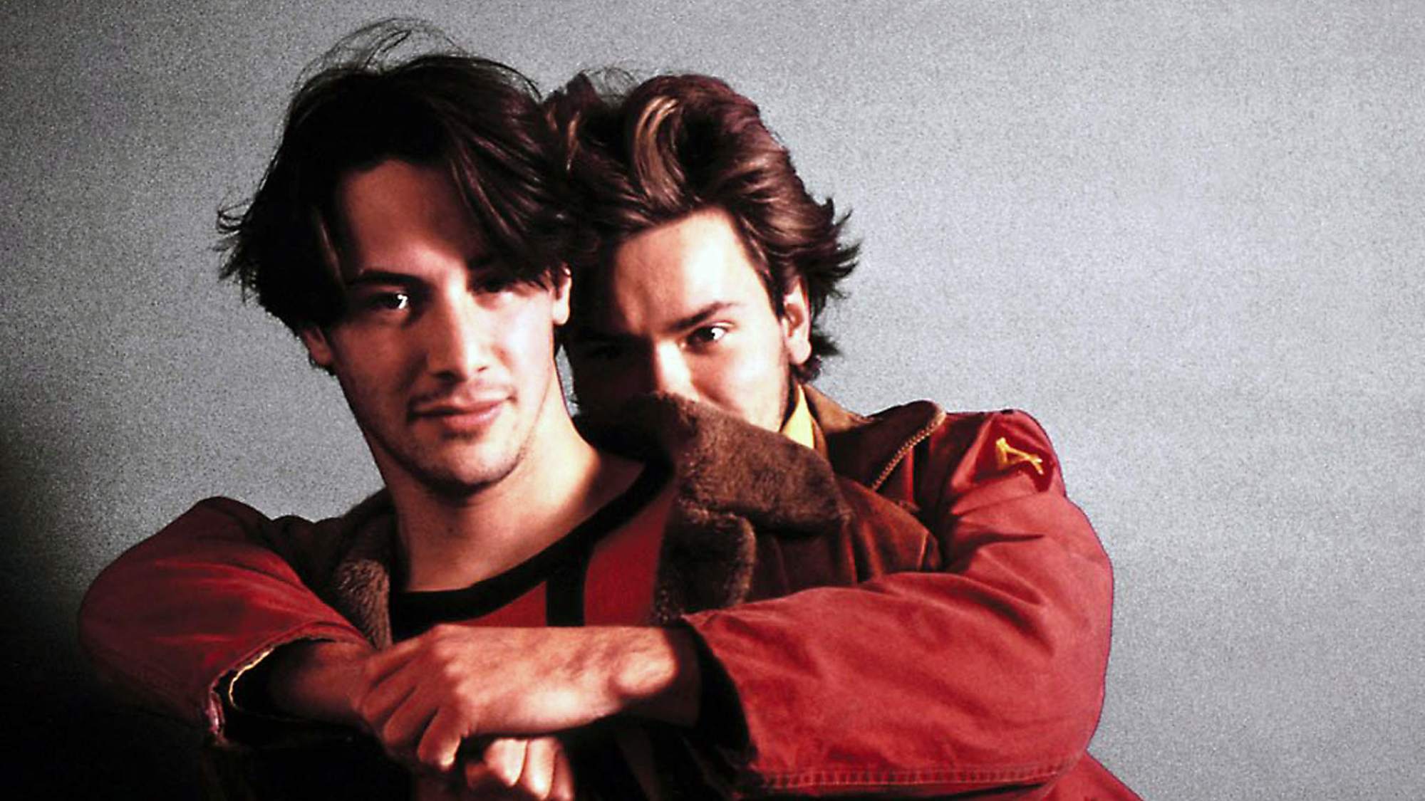 'My Private Idaho' Keanu Reeves as Scott Favor and River Phoenix as Mike Waters. Mike has his arms wrapped around Scott from behind.