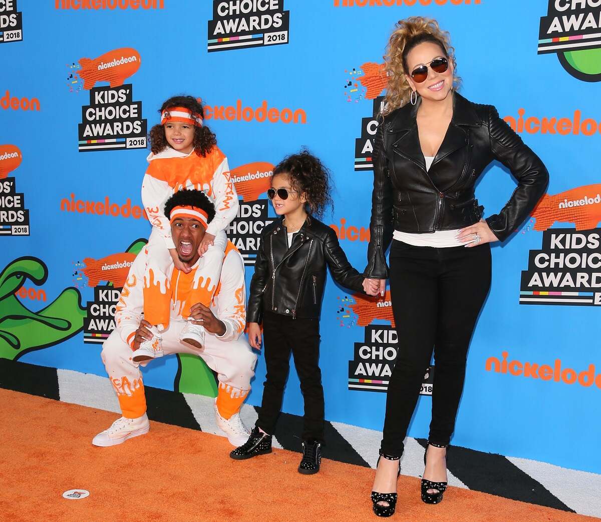 Nick Cannon and Mariah Carey with their children, Moroccan and Monreo Cannon, attend the 31st Annual Nickoldeaon Kids' Choice Awards in 2018