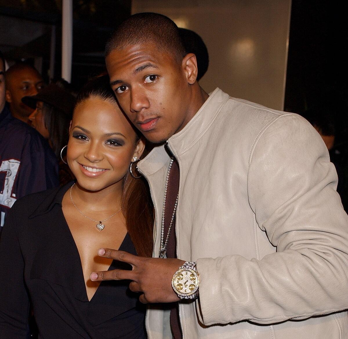 Christina Milian and Nick Cannon appear together at the premiere of 'Ray.' The couple dated from 2003 until 2005