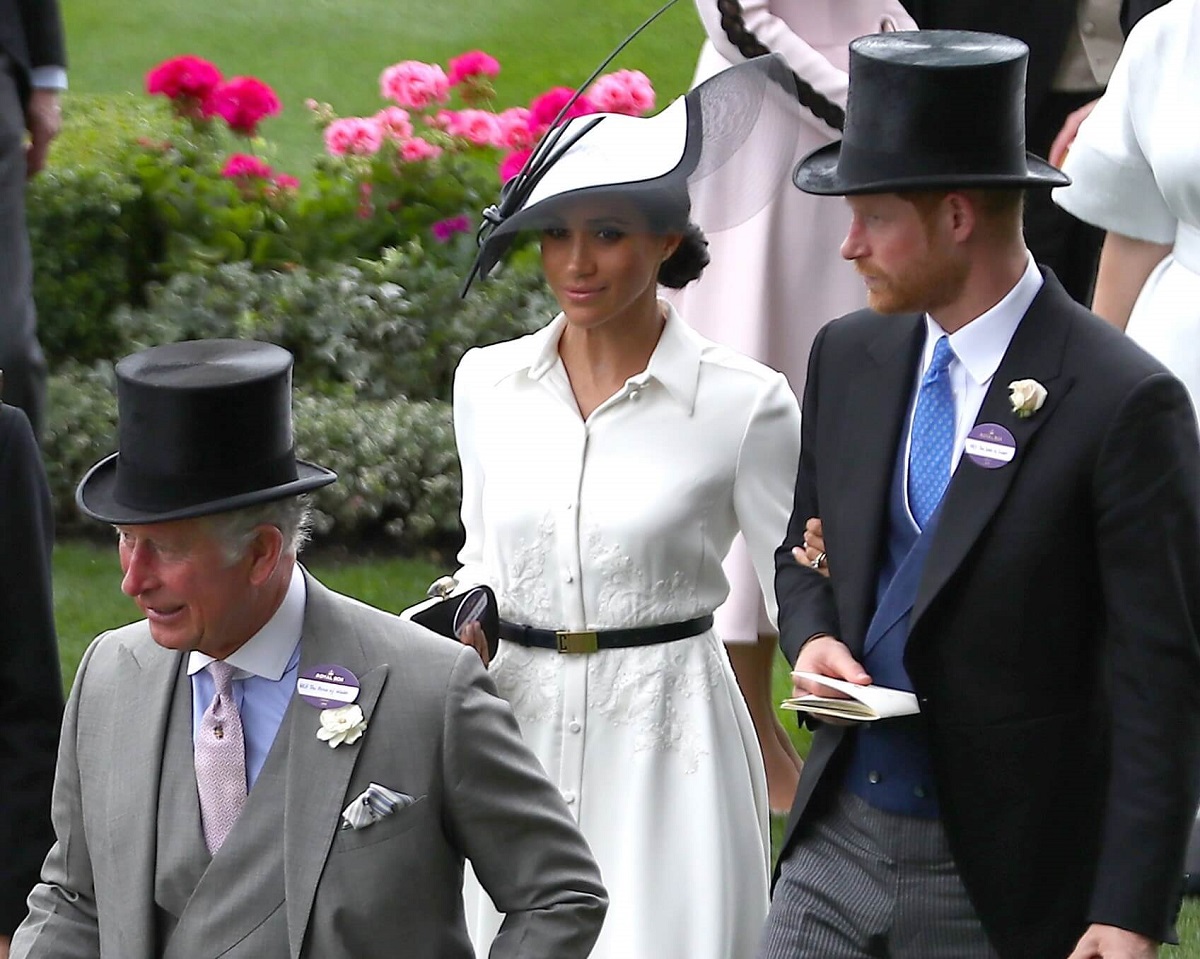 Now-King Charles III, Meghan Markle, and Prince Harry attend  attend day 1 of Royal Ascot in 2018