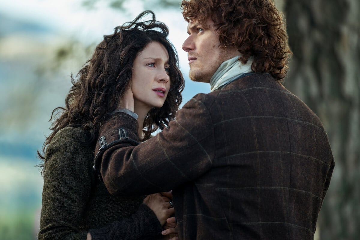 Outlander stars Caitriona Balfe (as Claire Randall Fraser), Sam Heughan (as Jamie Fraser) in an image from season 2