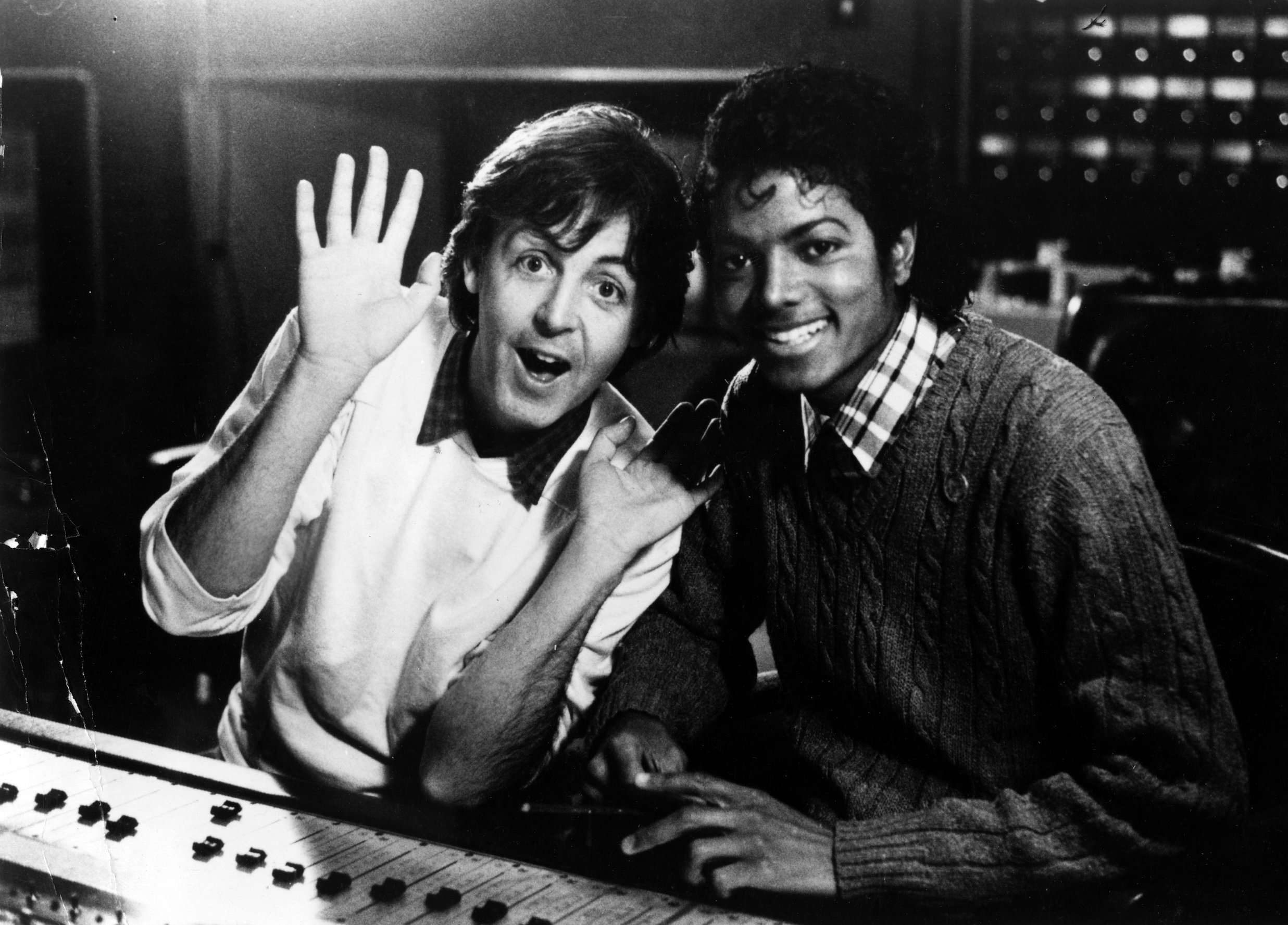 Paul McCartney and Michael Jackson collaborating in the studio
