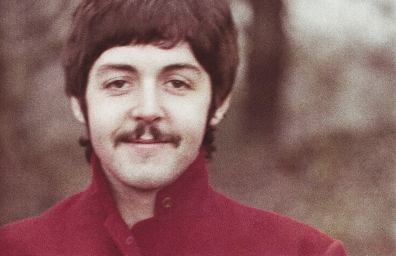 Paul McCartney in a red coat in 1967.