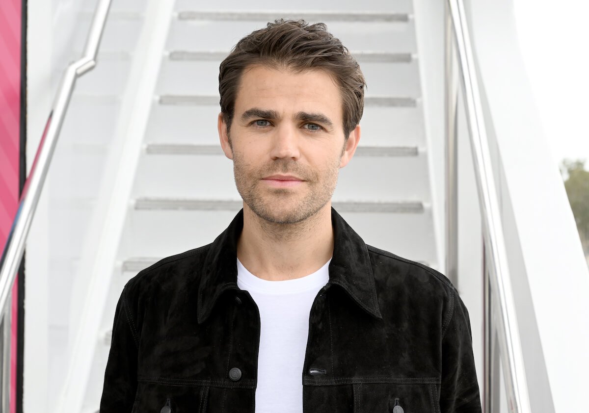 Paul Wesley with a serious face in front of a white background