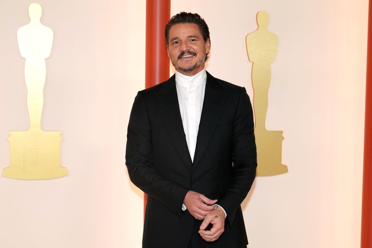 Pedro Pascal poses for a photo before heading in to the Academy Awards in 2023.