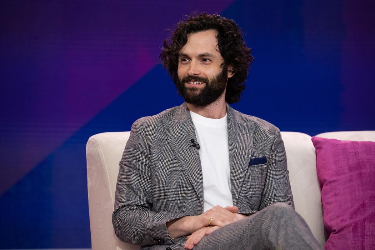 Penn Badgley sits on a couch on the "Today" show set.