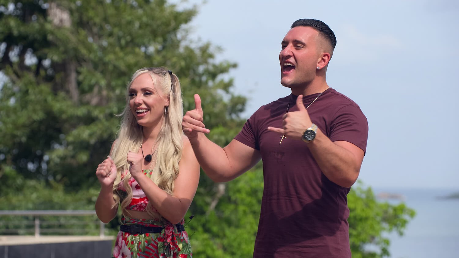 'Perfect Match' stars Joey and Kariselle smiling after a compatibility challenge in a production still from the season.