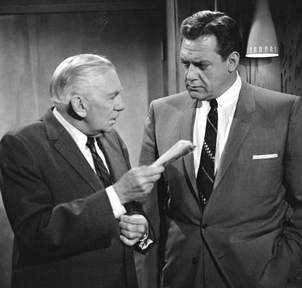 Black and white image of 'Perry Mason' cast members Ray Collins and Raymond Burr 