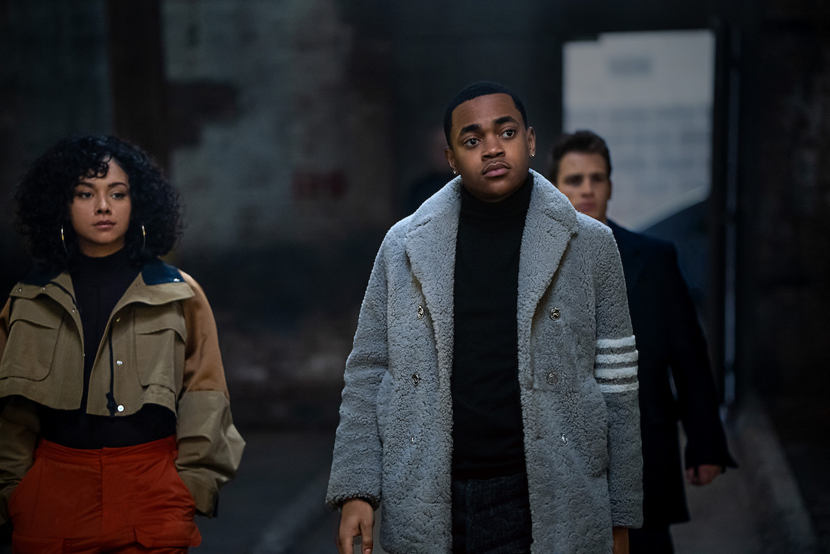Alix Lapri as Effie Morales, Michael Rainey Jr. as Tariq St. Patrick and Gianni Paolo as Brayden Weston walking into a warehouse in 'Power Book II: Ghost