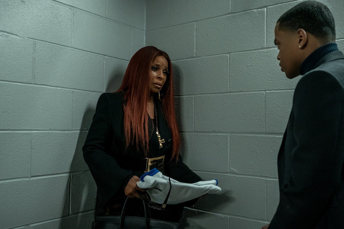 Mary J. Blige as Monet Tejada weeping as Michael Rainey Jr. as Tariq St. Patrick comforts her in 'Power Book II: Ghost'