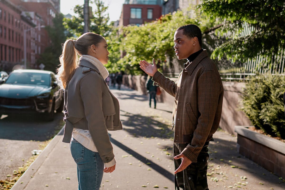 Paige Hurd as Lauren Baldwin and Michael Rainey Jr as Tariq St. Patrick having a tense conversation on the street in 'Power Book II: Ghost'