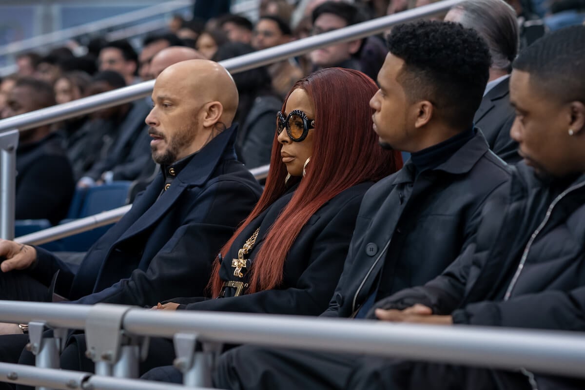 Berto Colon as Lorenzo Tejada, Mary J. Blige as Monet Tejada, Lovell Adams Gray as Dru Tejada and Woody McClain as Cane Tejada wearing all black and looking somber in 'Power Book II: Ghost'