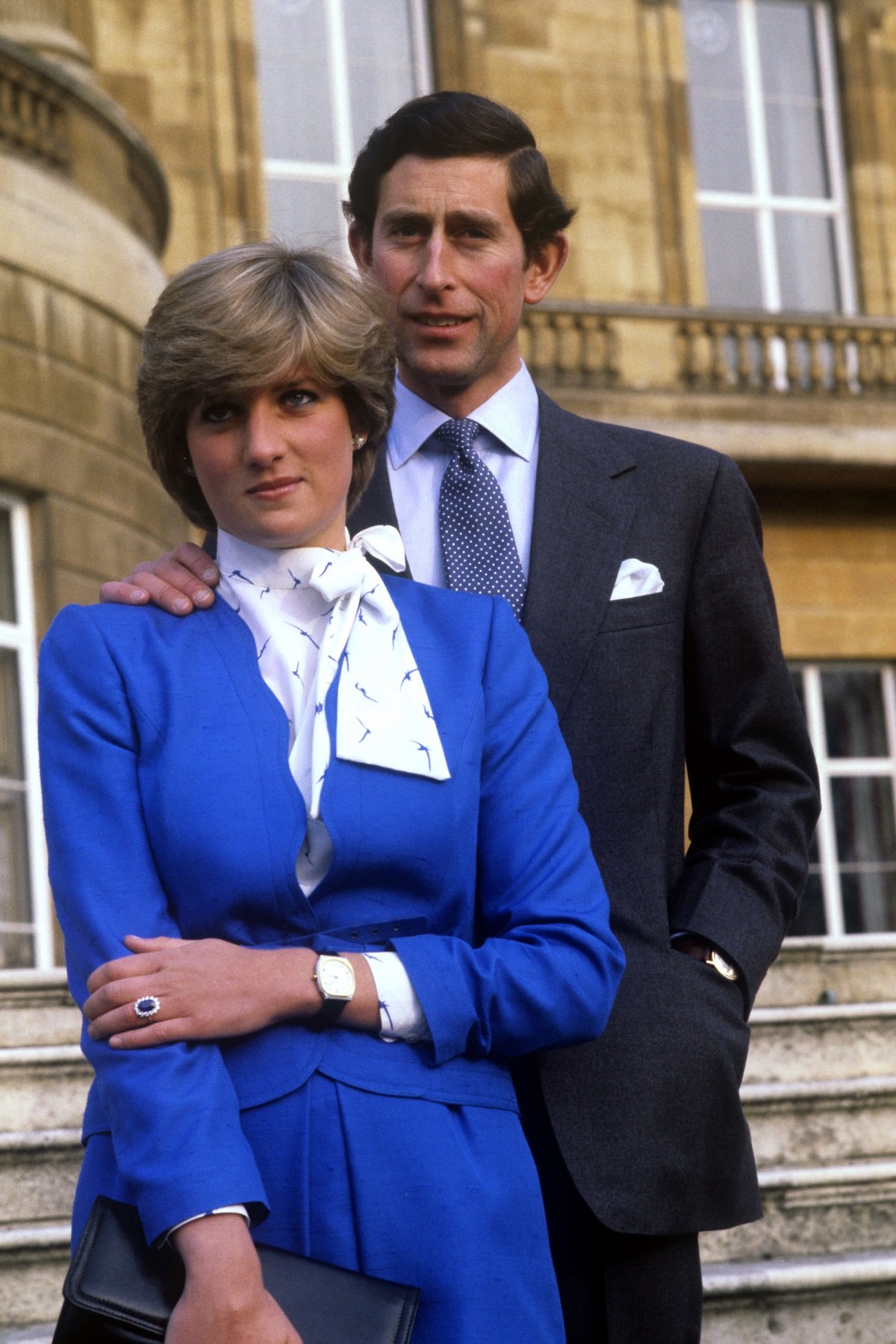 Prince Charles and Lady Diana Spencer, wearing the diamond and sapphire engagement ring he gave her, after announcing their engagement