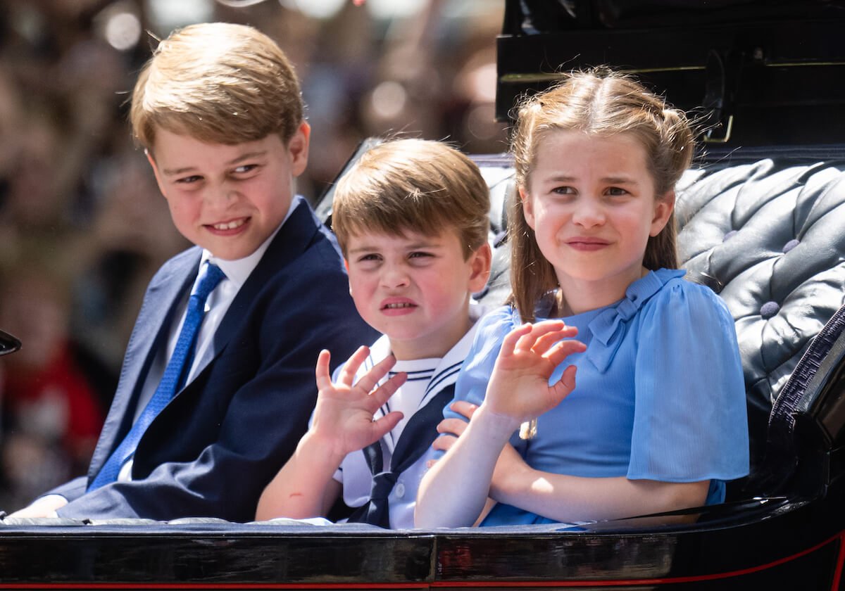 Prince George, Prince Louis, and Princess Charlotte, whom Prince William and Kate Middleton are predicted to 'break the cycle' of 'heir and spare,' wave