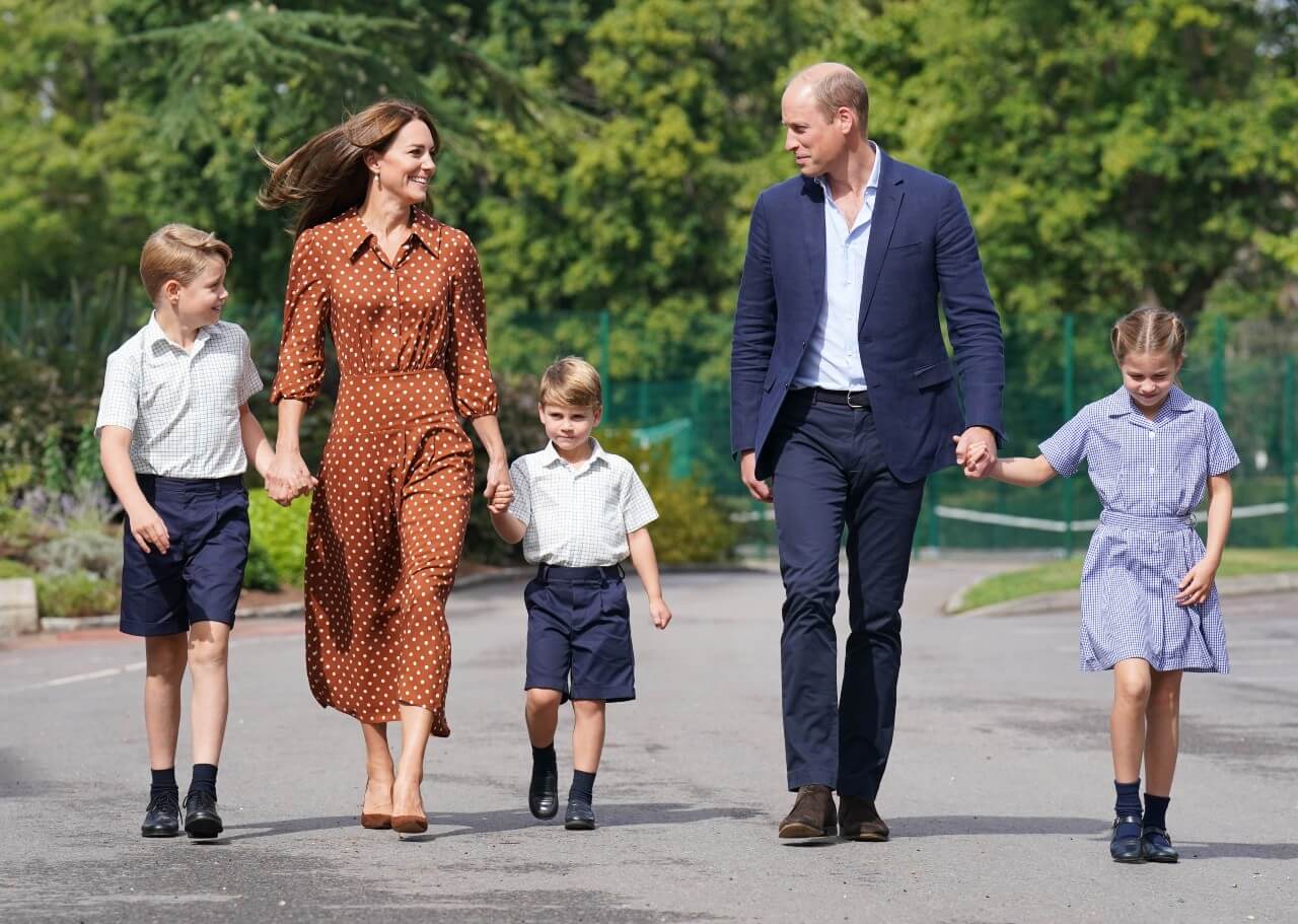 Prince George, Kate Middleton, Prince Louis, Prince William and Princess Charlotte walk together.