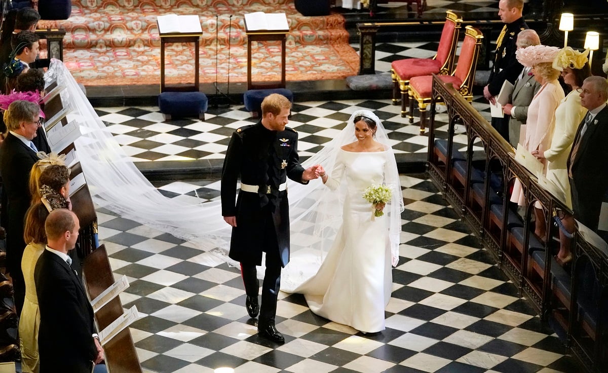 Prince Harry and Meghan Markle depart following their wedding in St George's Chapel at Windsor Castle