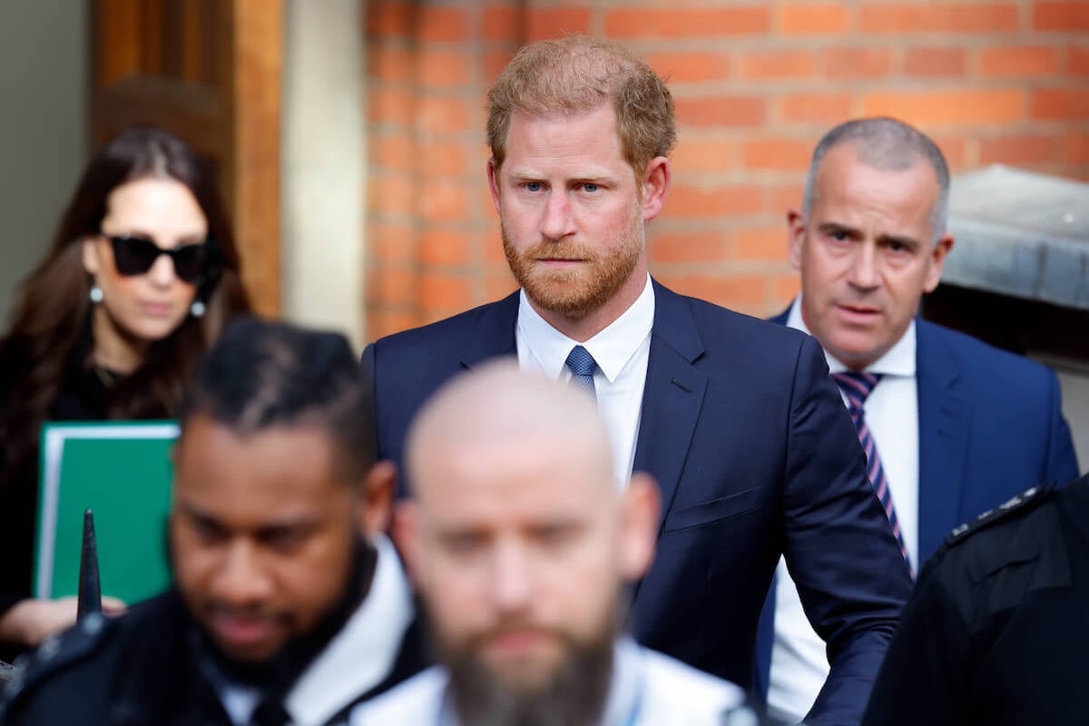 Prince Harry, whose surprise London court appearance may be part of new Sussex strategy, walks and looks on in London, England